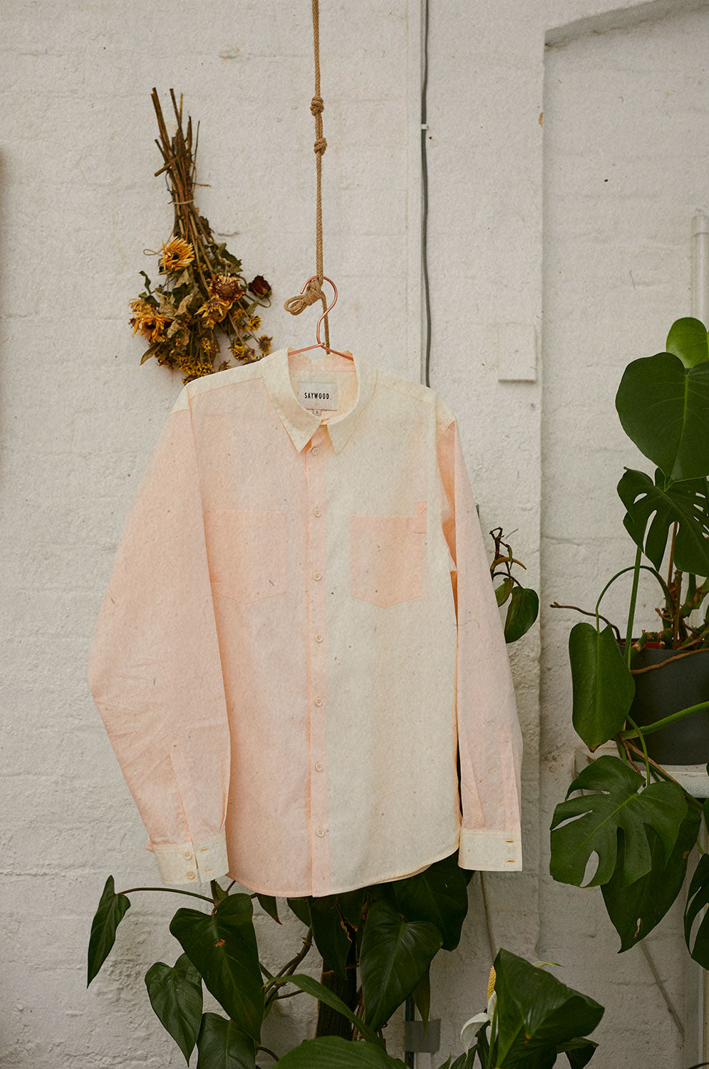 Eddy men's patchwork shirt in orange and lemon cotton with long sleeves and patch pockets, made in London by Saywood
