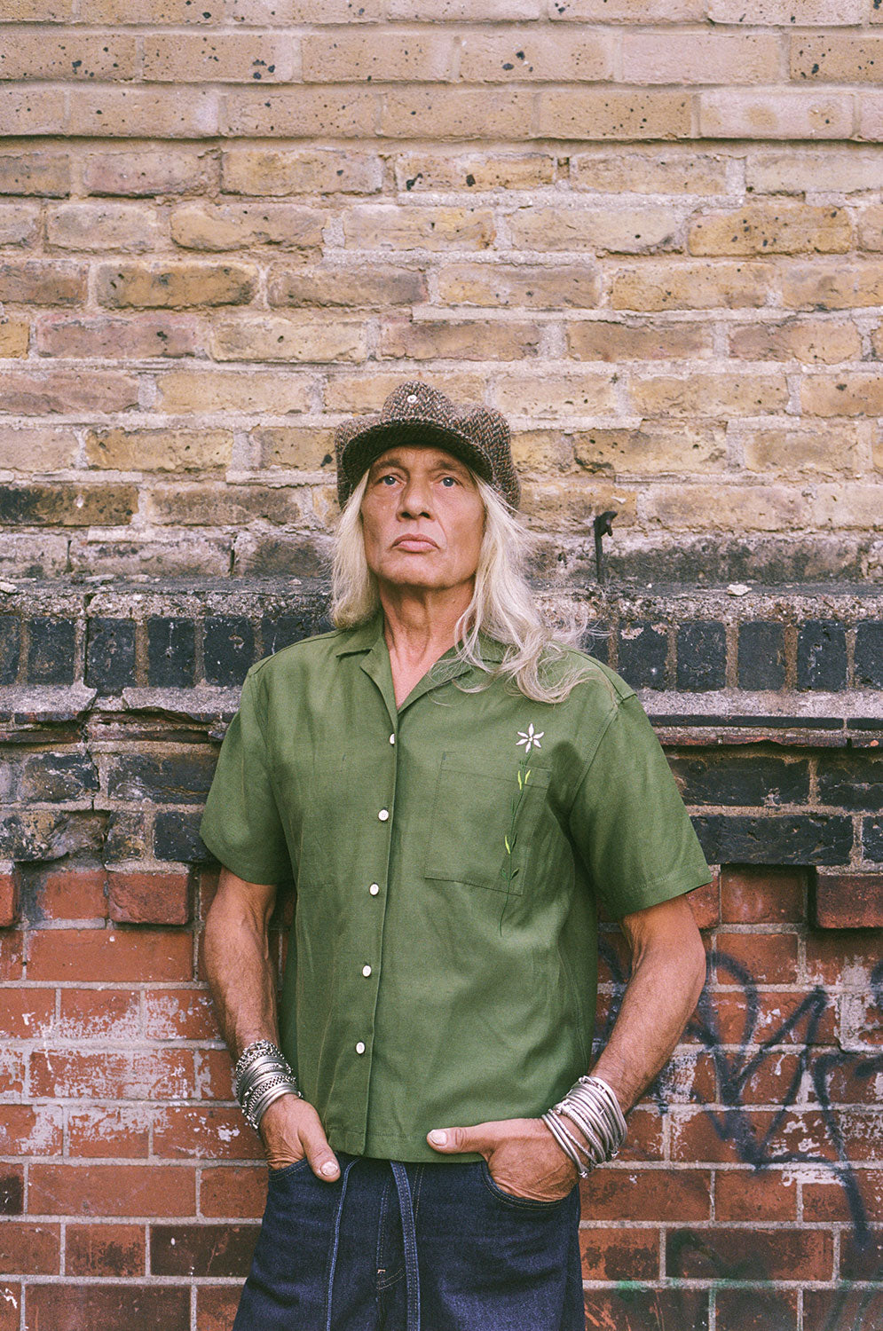 Frances unisex Cuban shirt in olive green with embroidered flower chest pocket, menswear styling by Saywood