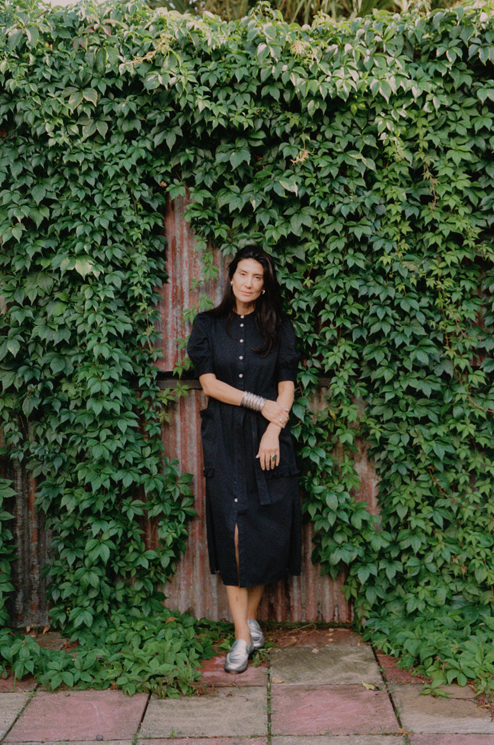 Evening styling: Rosa black Japanese denim shirtdress with puff sleeves and detachable belt by Saywood