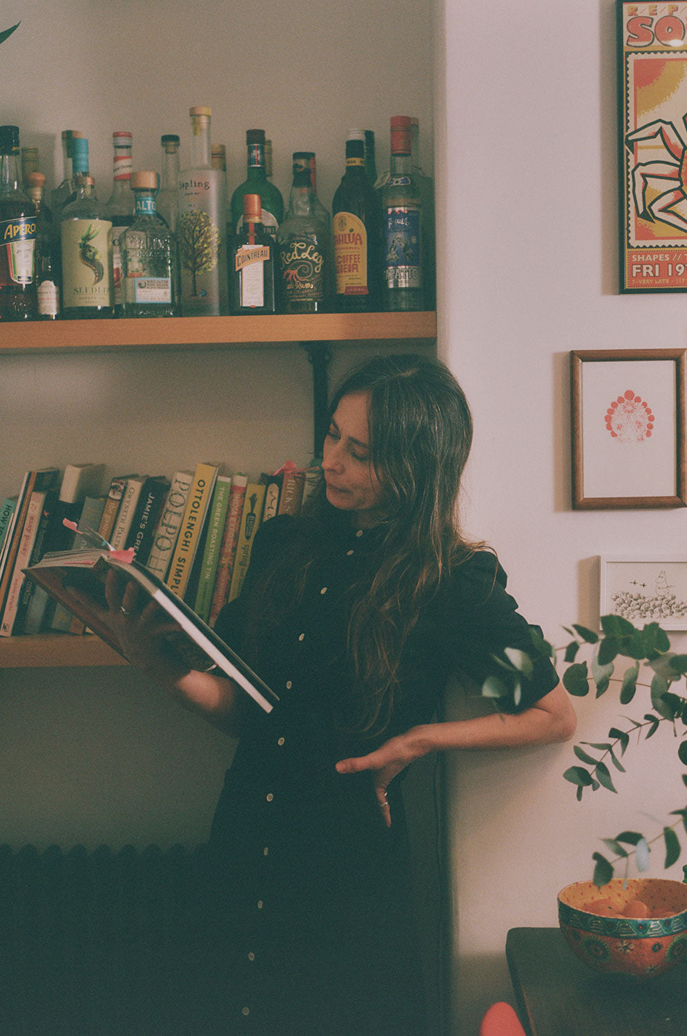 Lifestyle shot: Rosa puff sleeve shirtdress in black Japanese denim, made in London by Saywood