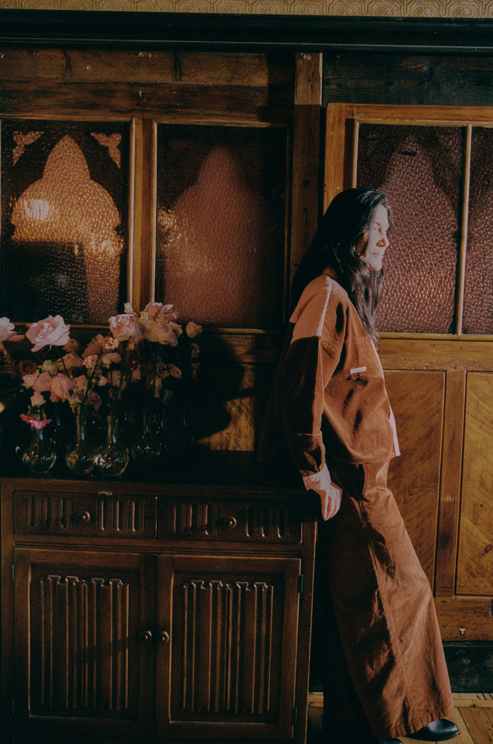 Side view: Amelia caramel corduroy trousers with chocolate corduroy boxy shirt, made in London by Saywood
