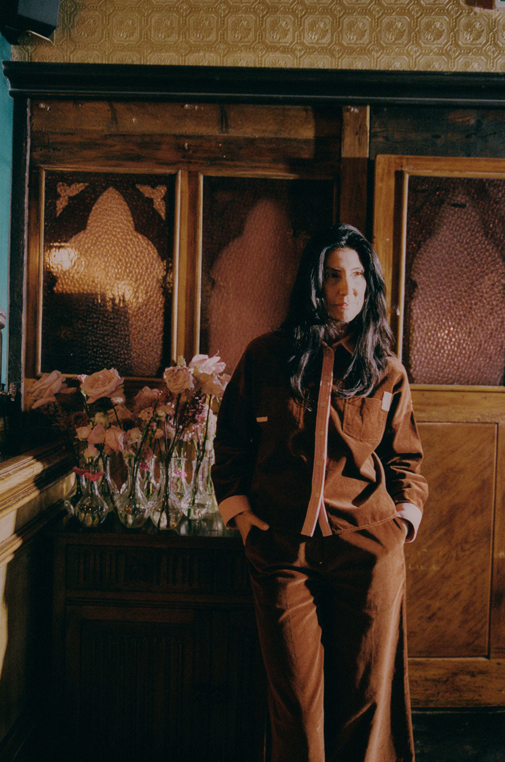 Styling inspiration: Lela caramel corduroy shirt with pink colourblock, boxy fit, worn with wide leg trousers by Saywood