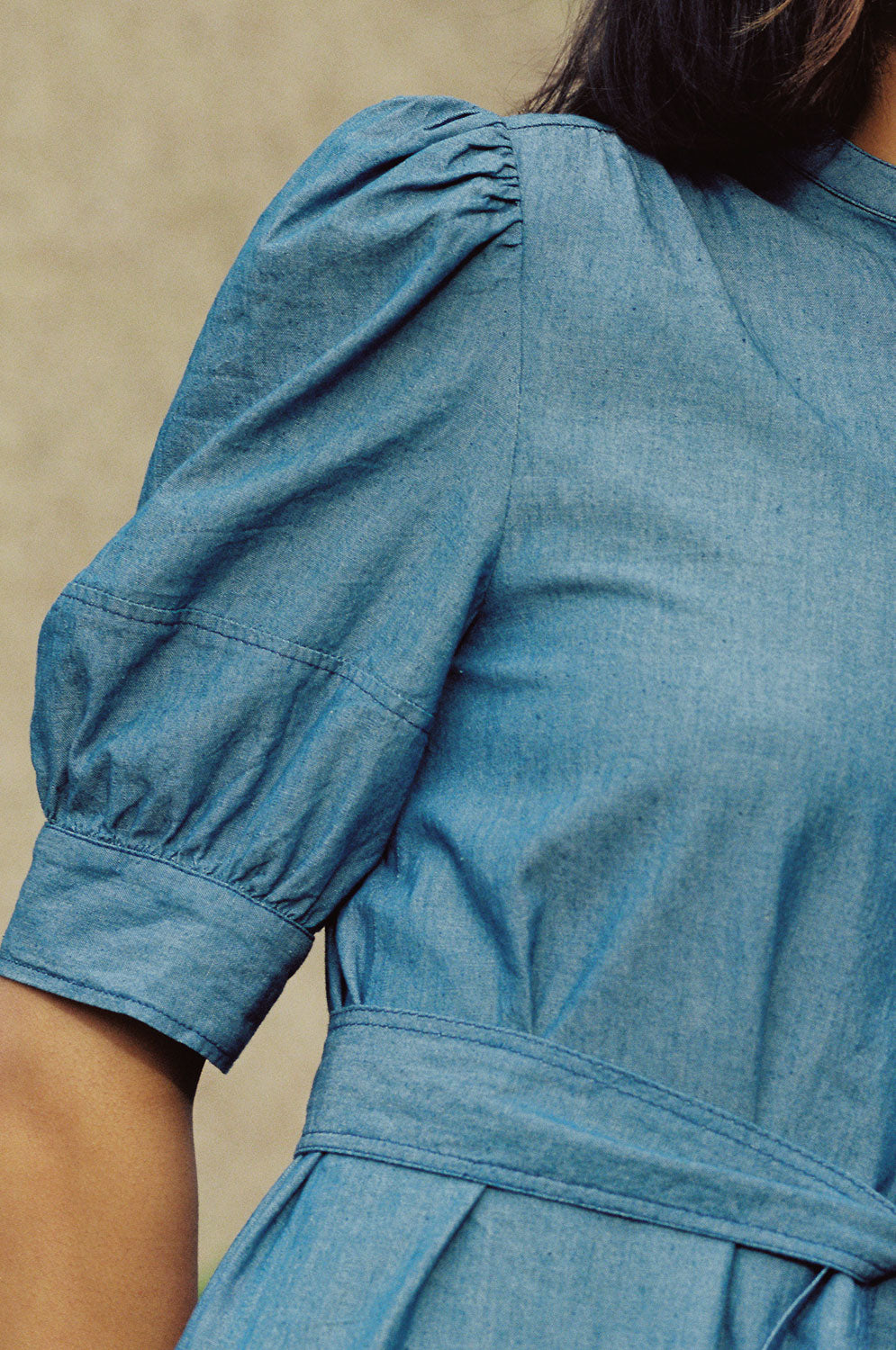 Close-up of Rosa Japanese denim shirtdress showing gathered puff sleeve detail
