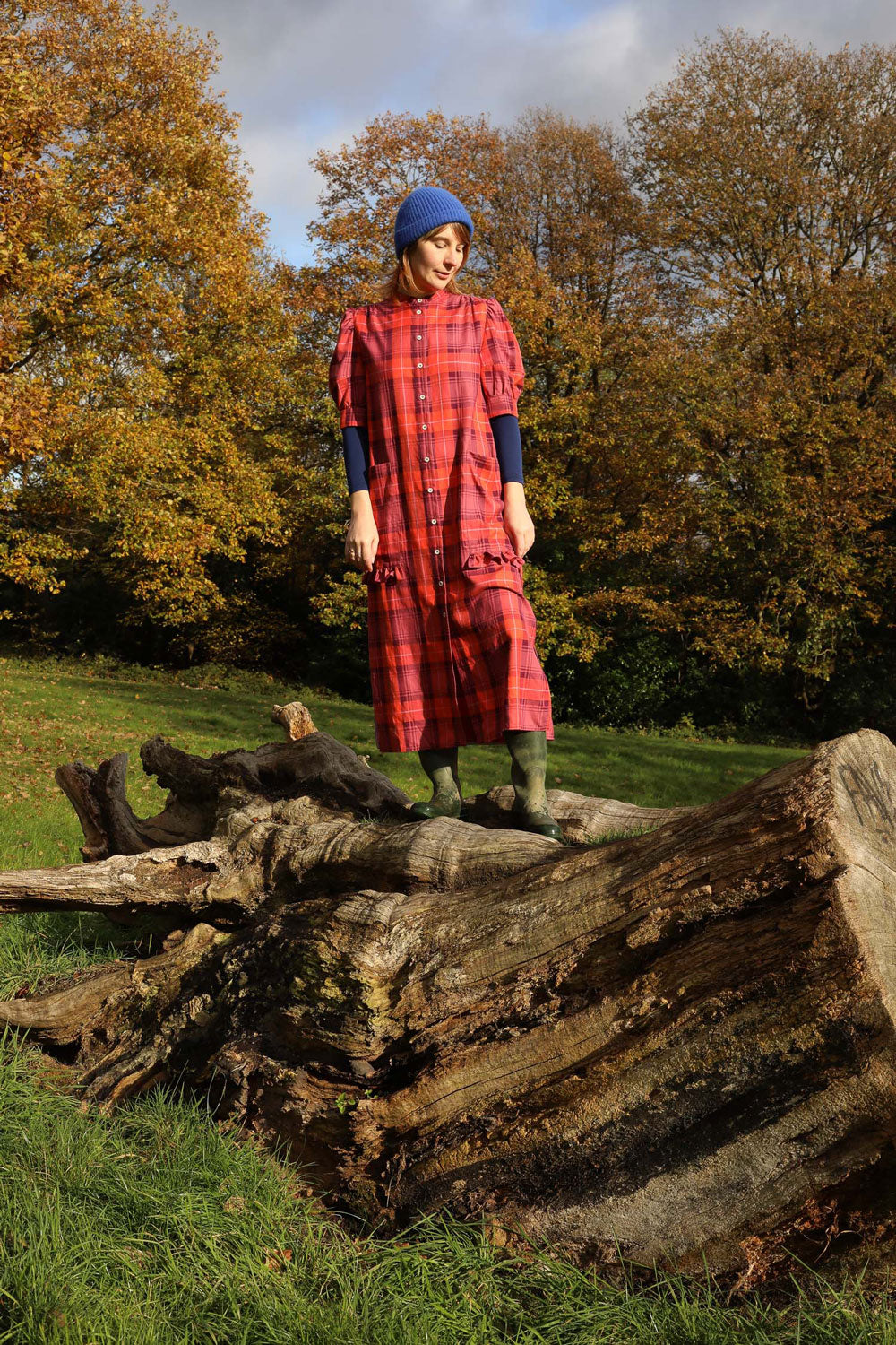 Styling inspiration: Rosa red tartan shirtdress layered over long sleeve top, year-round versatile styling by Saywood