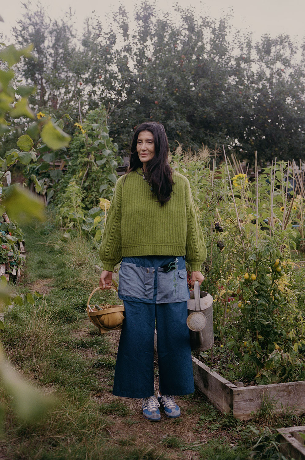 Styling inspiration: Amelia Japanese denim trousers with Adams moss green fisherman's rib sweater and denim Gardener's Apron by Saywood