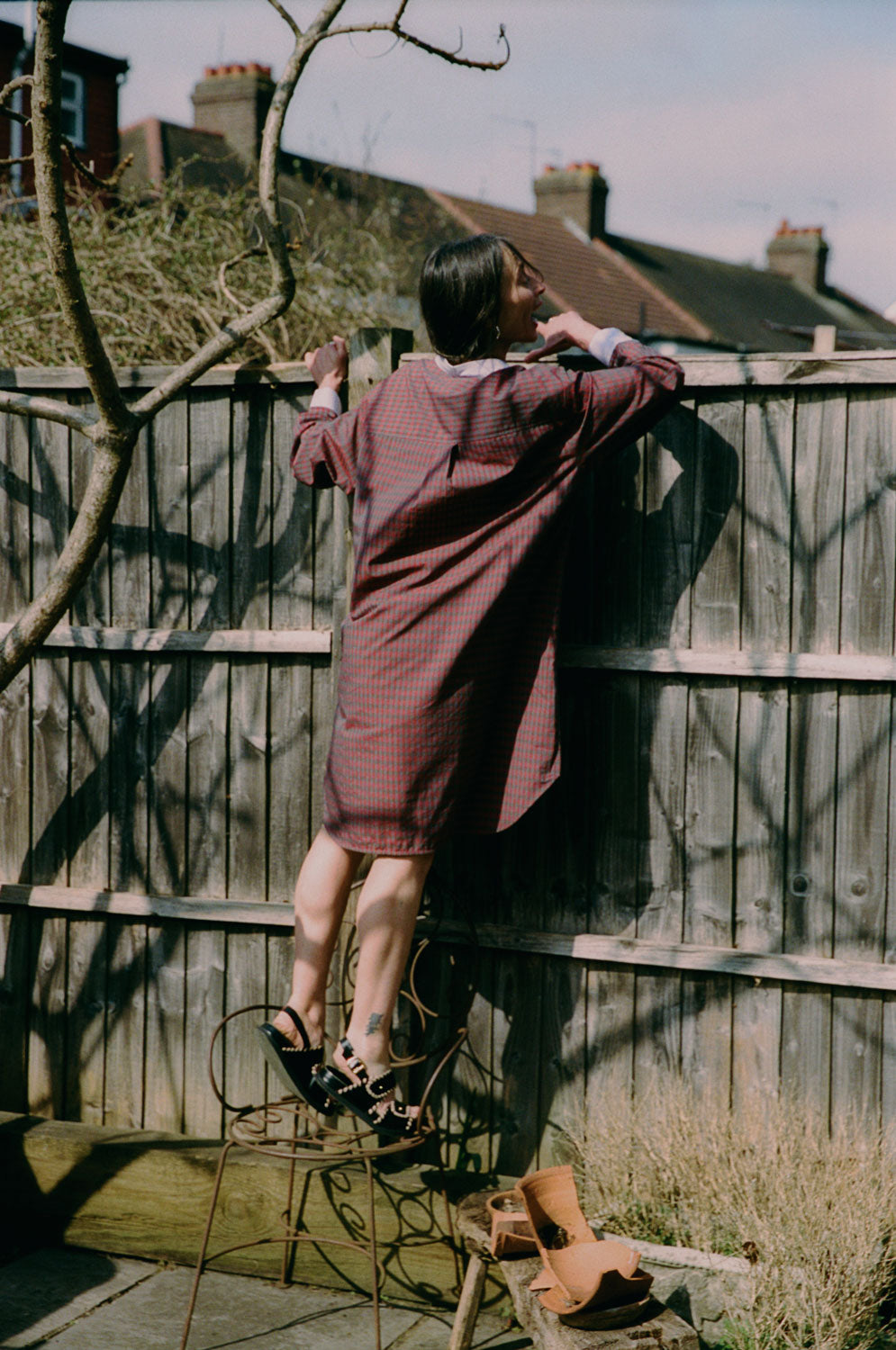 Etta red check shirtdress back view showing box pleat detail and oversized fit, sustainable fashion by Saywood