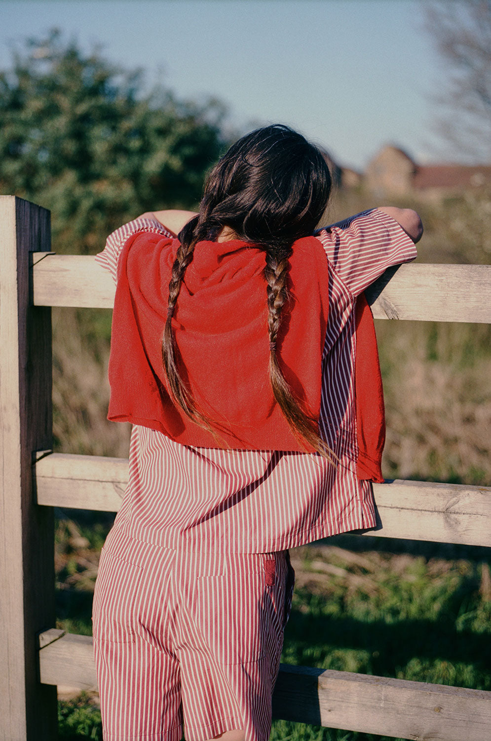 Back view: Bessie berry red stripe shorts showing herringbone tape pocket detail, made in London by Saywood