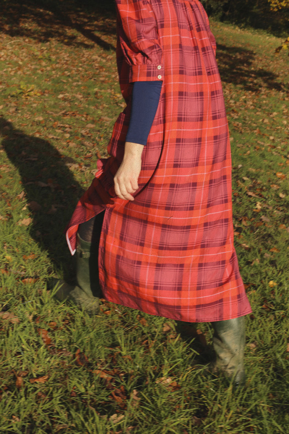 Rosa red tartan shirtdress styled with wellington boots, outdoor lifestyle shot by Saywood