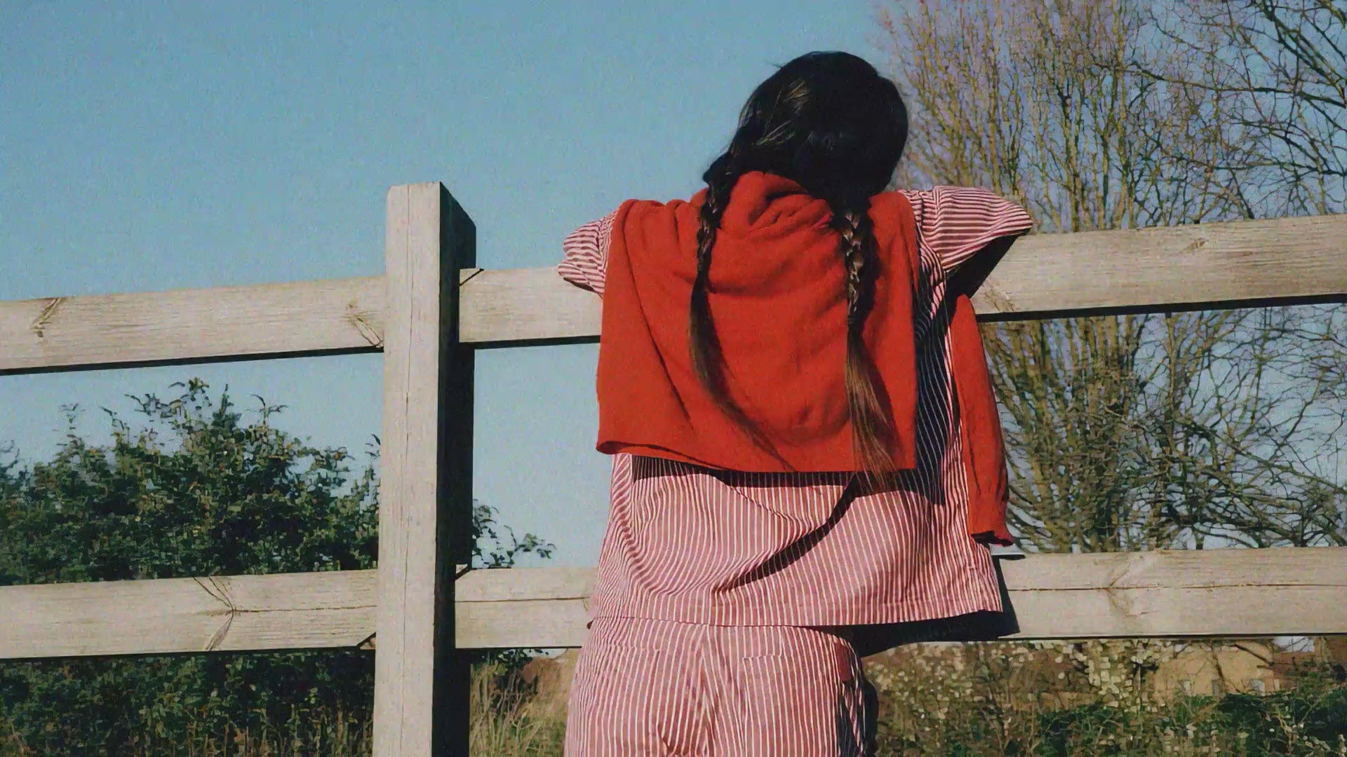 Frances Shirt and Bessie Shorts in red and white stripe cotton, shot outdoors. Made in the UK by Saywood.