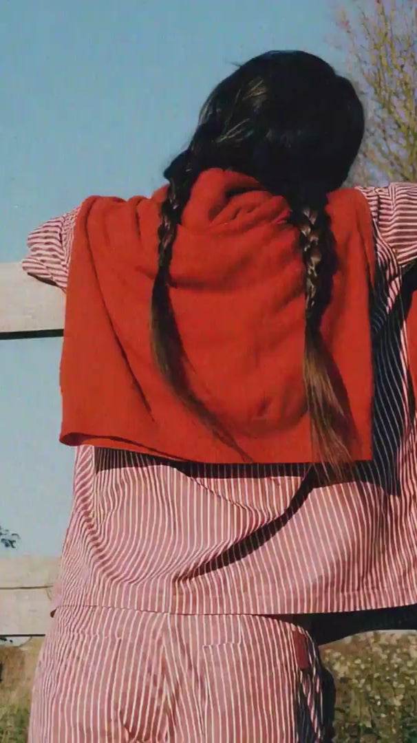 Frances Shirt and Bessie Shorts in red and white stripe cotton, shot outdoors. Made in the UK by Saywood.